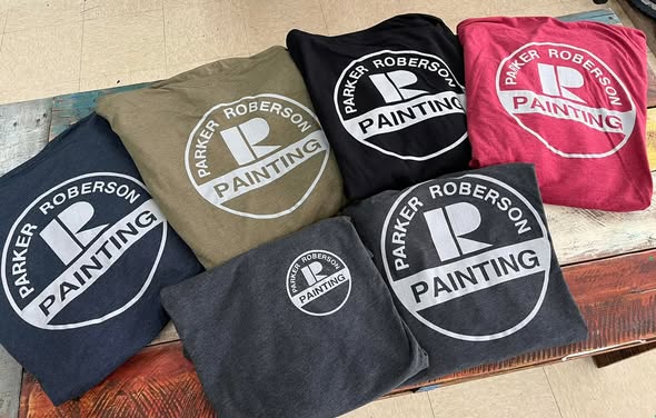 Embroidered polo shirts with company logo for professional staff uniforms